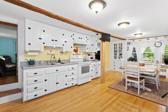 166 New Boston Rd, Goffstown, NH 03045 - kitchen with white appliances, a sink, under cabinet range hood, light wood-style flooring, and white cabinets