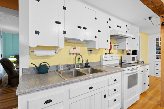 166 New Boston Rd, Goffstown, NH 03045 - kitchen featuring white appliances, a sink, under cabinet range hood, light wood-type flooring, and white cabinetry