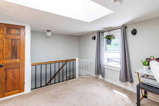 129 Indigo Hill Rd, Somersworth, NH 03878 - spare room featuring carpet flooring, a skylight, and baseboards