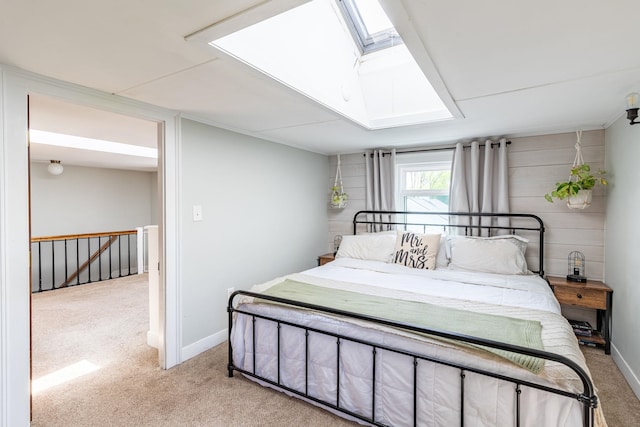 129 Indigo Hill Rd, Somersworth, NH 03878 - bedroom featuring a skylight, light colored carpet, and baseboards