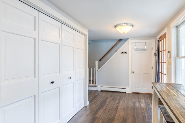 129 Indigo Hill Rd, Somersworth, NH 03878 - entryway featuring baseboard heating, dark wood-type flooring, and stairs