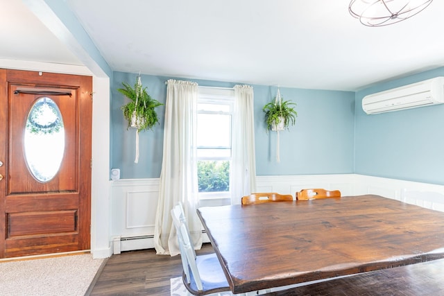 129 Indigo Hill Rd, Somersworth, NH 03878 - dining room with an AC wall unit, plenty of natural light, a baseboard heating unit, a wainscoted wall, and dark wood finished floors