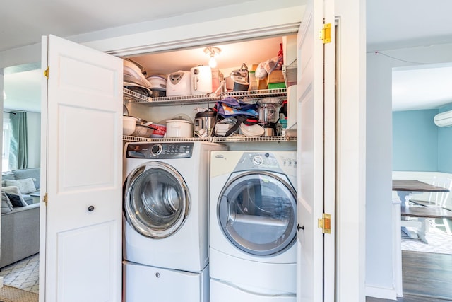 129 Indigo Hill Rd, Somersworth, NH 03878 - washroom with washing machine and clothes dryer and wood finished floors