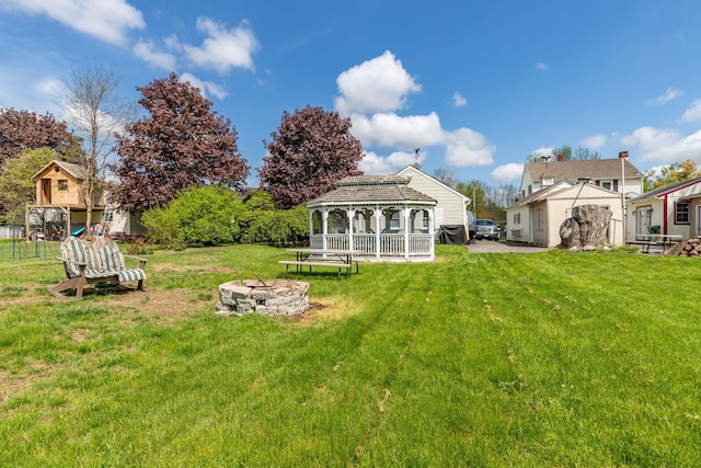 129 Indigo Hill Rd, Somersworth, NH 03878 - view of green lawn featuring a gazebo and a fire pit