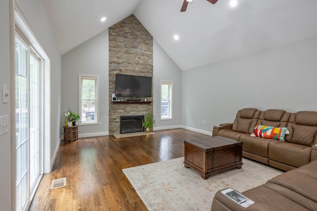 35 Northland Rd, Windham, NH 03087 - living area with a ceiling fan, high vaulted ceiling, wood finished floors, a stone fireplace, and baseboards