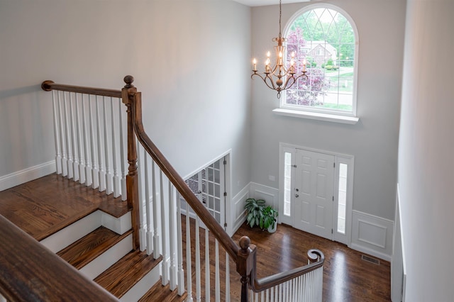 35 Northland Rd, Windham, NH 03087 - foyer featuring a chandelier, wood finished floors, wainscoting, and a decorative wall