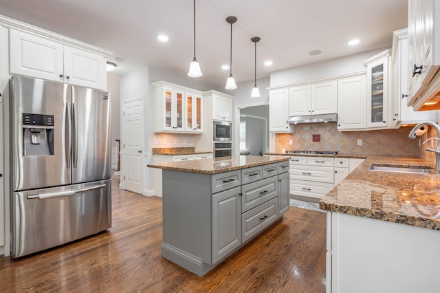 35 Northland Rd, Windham, NH 03087 - kitchen with stainless steel appliances, a sink, gray cabinets, a center island, and white cabinetry