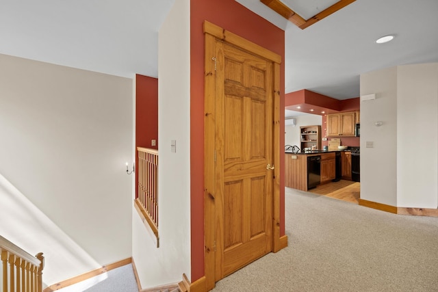 143 Bridge Rd Unit Vc331, Jay, VT 05859 - corridor featuring light colored carpet, baseboards, and recessed lighting