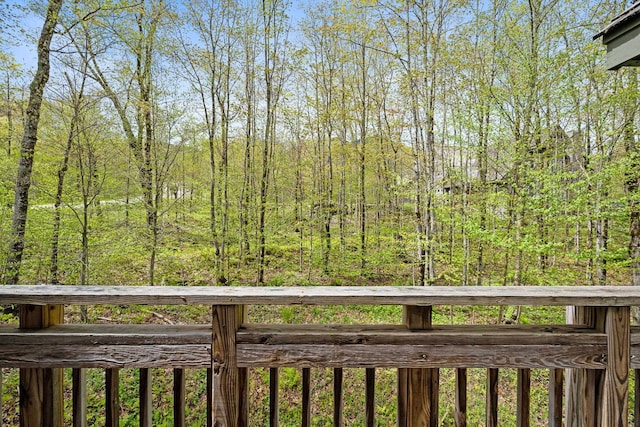 143 Bridge Rd Unit Vc331, Jay, VT 05859 - deck featuring a view of trees