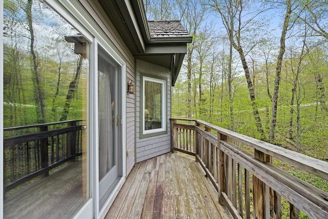 143 Bridge Rd Unit Vc331, Jay, VT 05859 - deck with a forest view