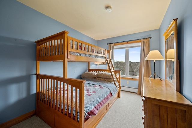 143 Bridge Rd Unit Vc331, Jay, VT 05859 - bedroom with a baseboard heating unit, carpet floors, and baseboards