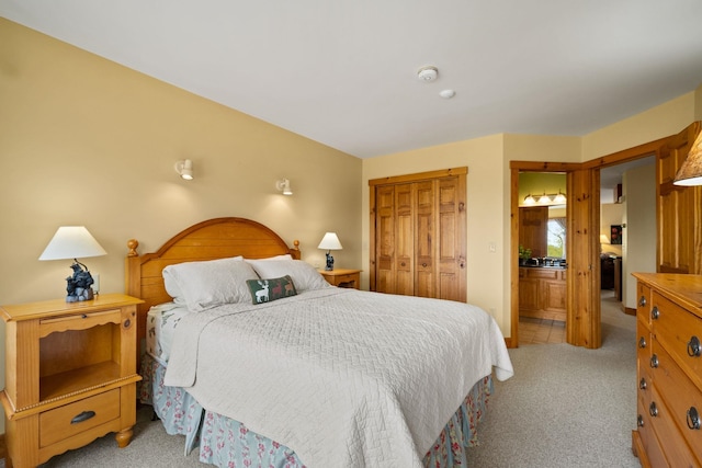 143 Bridge Rd Unit Vc331, Jay, VT 05859 - bedroom featuring light colored carpet, a closet, and ensuite bath