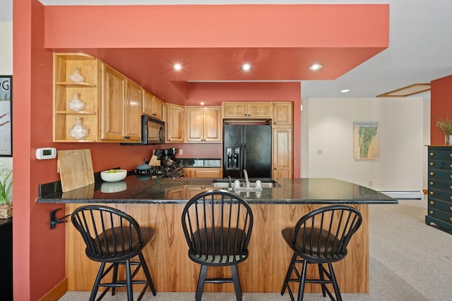 143 Bridge Rd Unit Vc331, Jay, VT 05859 - kitchen with black appliances, baseboard heating, a sink, a peninsula, and open shelves