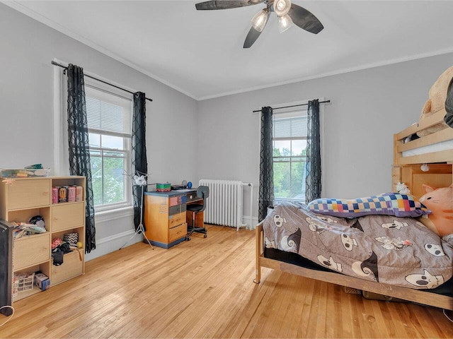 65 Congress St, Saint Albans City, VT 05478 - bedroom with radiator heating unit, hardwood / wood-style flooring, ornamental molding, baseboards, and a ceiling fan
