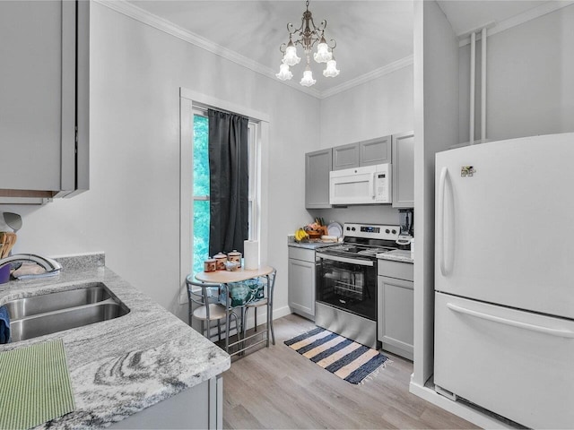 65 Congress St, Saint Albans City, VT 05478 - kitchen with white appliances, gray cabinetry, a sink, crown molding, and light wood-type flooring
