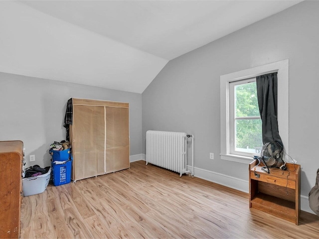 65 Congress St, Saint Albans City, VT 05478 - bonus room with radiator, vaulted ceiling, wood finished floors, and baseboards