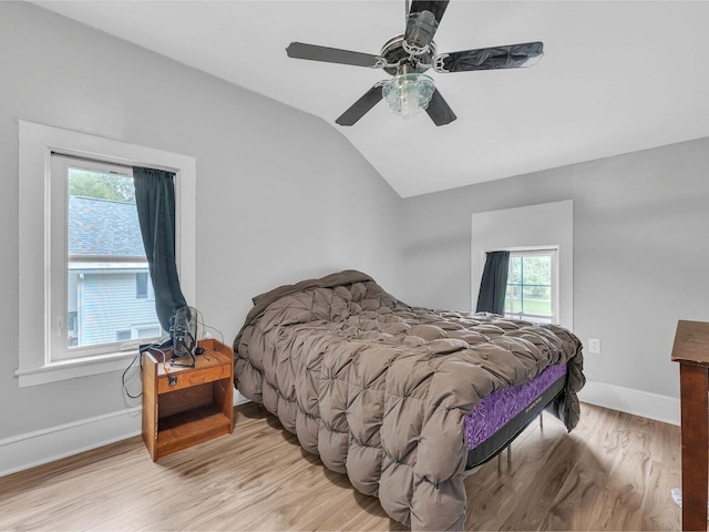 65 Congress St, Saint Albans City, VT 05478 - bedroom featuring vaulted ceiling, light wood finished floors, multiple windows, baseboards, and a ceiling fan