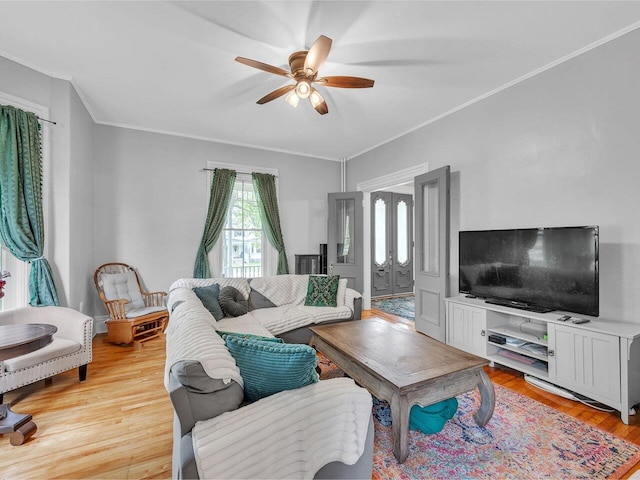 65 Congress St, Saint Albans City, VT 05478 - living area with crown molding, a ceiling fan, and light wood-style floors