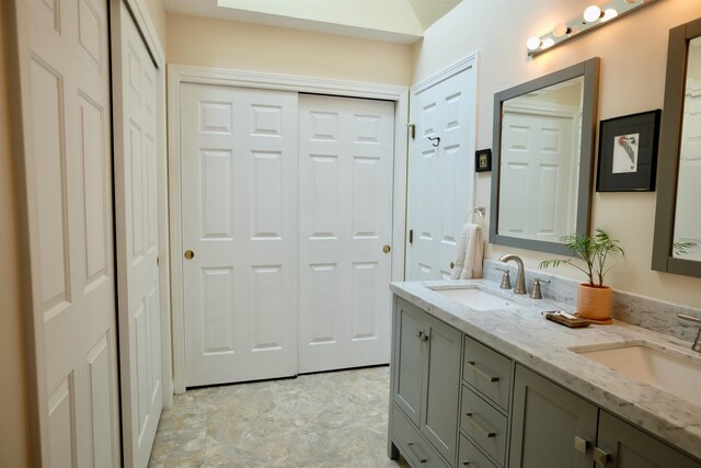 205 Mountain Rd, Concord, NH 03301 - bathroom with double vanity and a closet