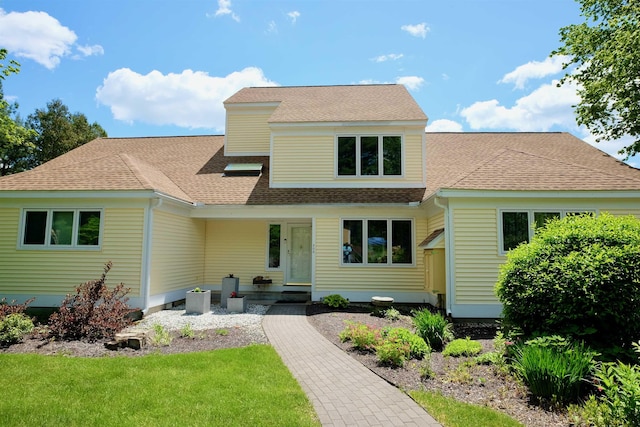 205 Mountain Rd, Concord, NH 03301 - view of front of house with roof with shingles and a front lawn