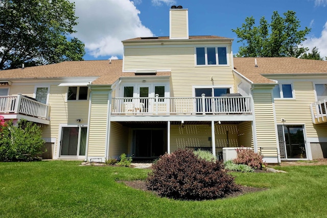 205 Mountain Rd, Concord, NH 03301 - rear view of property with a chimney, a yard, and roof with shingles