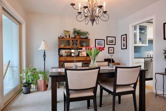 205 Mountain Rd, Concord, NH 03301 - carpeted dining area featuring a chandelier