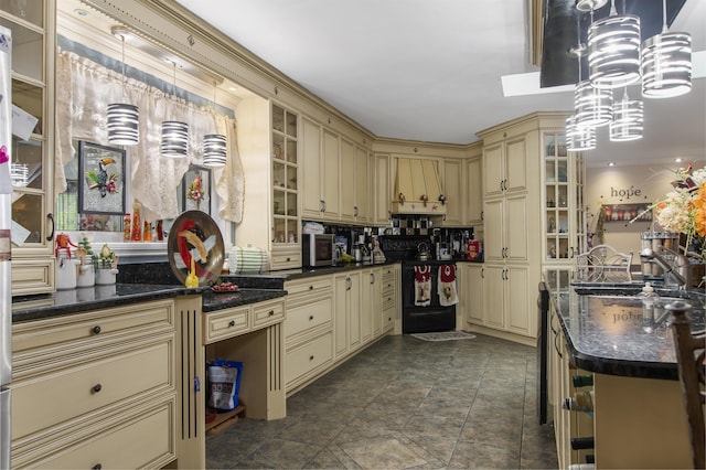 128 Fuller Dr, Canaan, VT 05903 - kitchen with cream cabinets, black range with electric cooktop, a chandelier, and hanging light fixtures