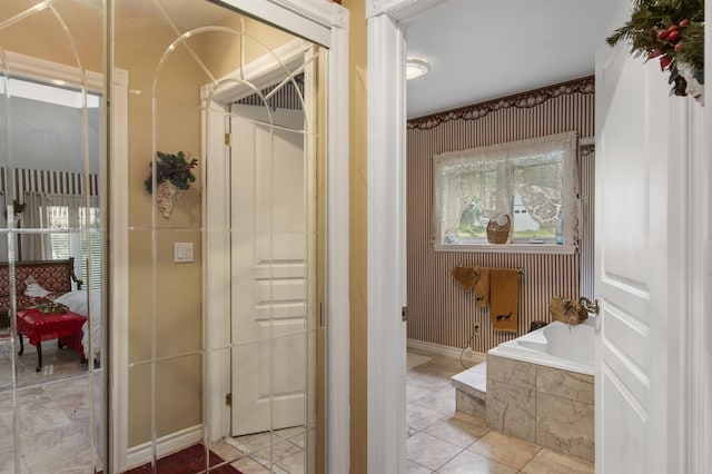 128 Fuller Dr, Canaan, VT 05903 - full bath with a garden tub, plenty of natural light, and tile patterned floors