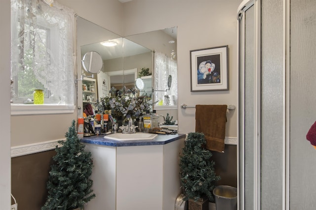 128 Fuller Dr, Canaan, VT 05903 - bathroom with vanity and a shower with shower door