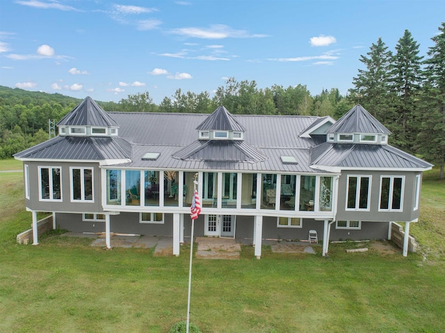 128 Fuller Dr, Canaan, VT 05903 - rear view of property featuring a lawn and stucco siding