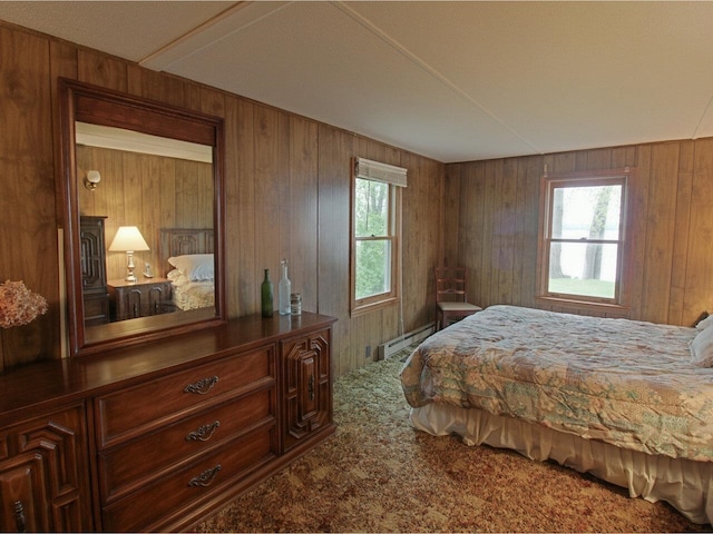 244 Tranquility Ln, Saint Albans Town, VT 05478 - carpeted bedroom with a baseboard heating unit, multiple windows, and wood walls