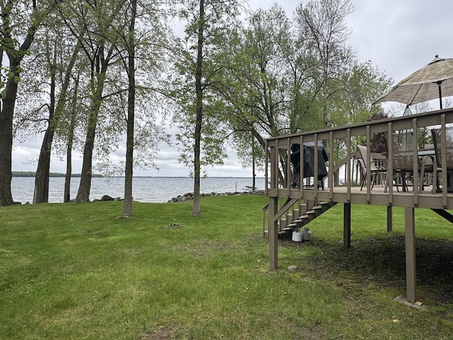 244 Tranquility Ln, Saint Albans Town, VT 05478 - view of grassy yard featuring stairs and a deck with water view