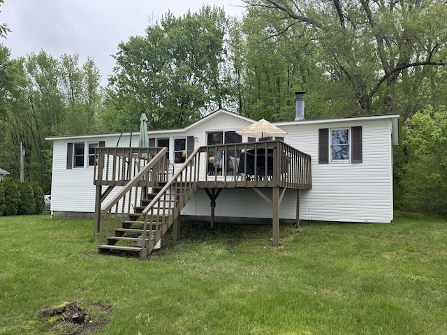 244 Tranquility Ln, Saint Albans Town, VT 05478 - back of property featuring a wooden deck and a lawn