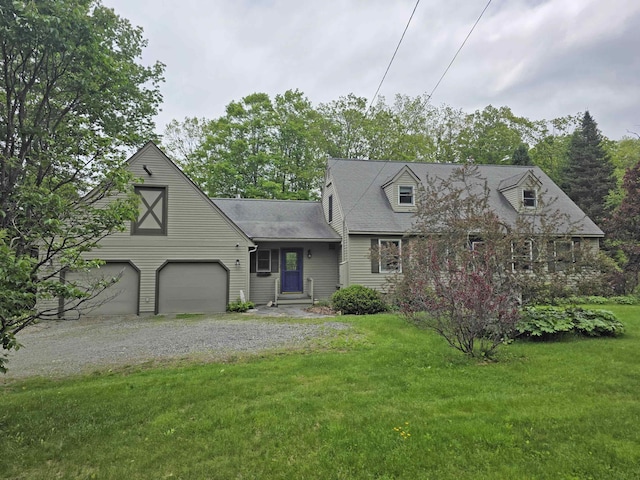 1073 Upper Dummerston Rd, Brattleboro, VT 05301 - cape cod home featuring gravel driveway, a garage, a front yard, and a shingled roof