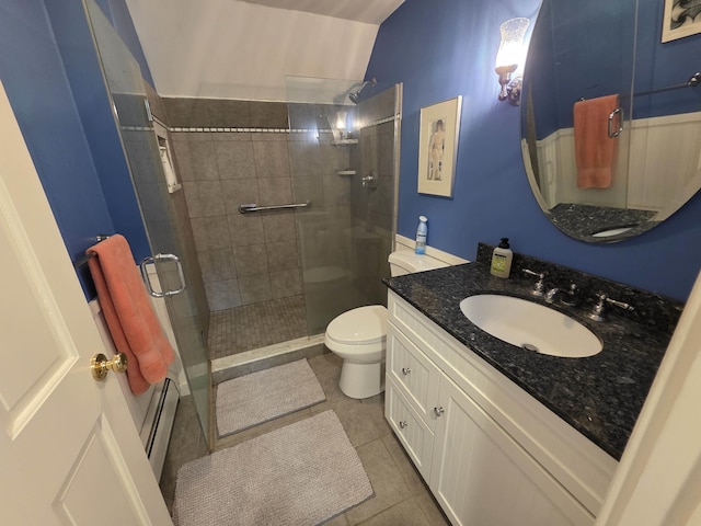 1073 Upper Dummerston Rd, Brattleboro, VT 05301 - full bathroom featuring baseboard heating, a stall shower, vanity, and toilet