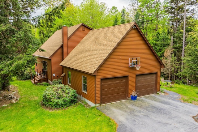 8 Mill Pond Rd, Grantham, NH 03753 - view of front of house with roof with shingles, a detached garage, a chimney, and a front yard