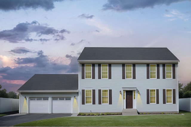 1 Hayden St, Nashua, NH 03060 - colonial-style house with asphalt driveway and an attached garage