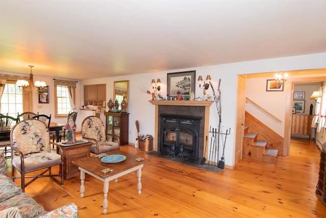 88 Kibling Hill Rd, Tunbridge, VT 05077 - living room featuring a chandelier, stairs, and light wood finished floors