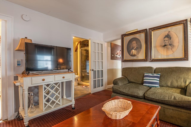 5 N Main St, Wilmington, VT 05363 - living area featuring french doors, carpet flooring, and baseboards
