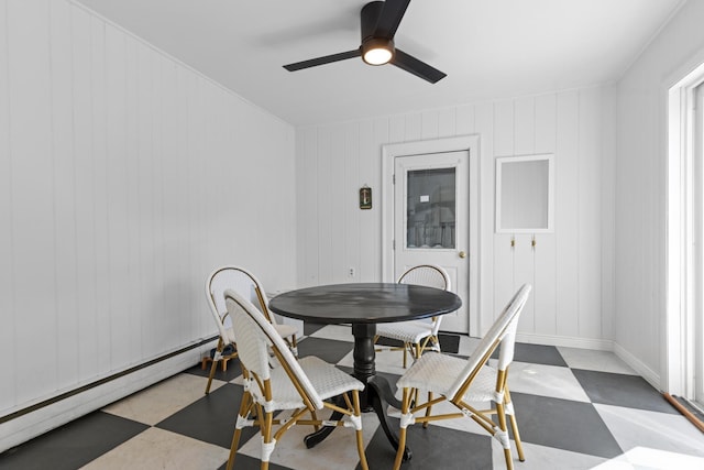 7 Lamson Ln, Hampton, NH 03842 - dining area with tile patterned floors, a ceiling fan, and a baseboard heating unit
