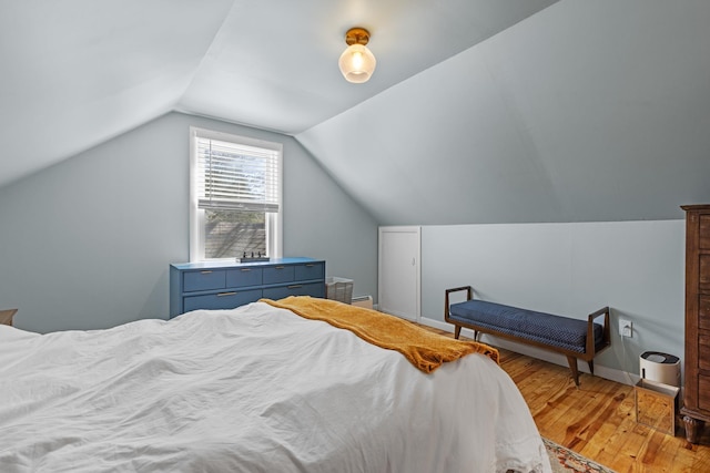 7 Lamson Ln, Hampton, NH 03842 - bedroom featuring light wood finished floors and lofted ceiling