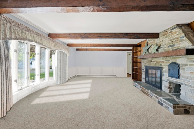 44 Weare Rd, Seabrook, NH 03874 - unfurnished living room featuring carpet floors, a fireplace, beamed ceiling, and a wainscoted wall