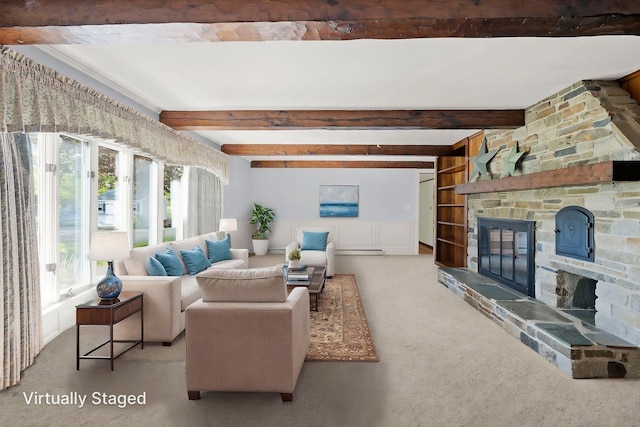 44 Weare Rd, Seabrook, NH 03874 - living area with a fireplace, beam ceiling, carpet, and built in features
