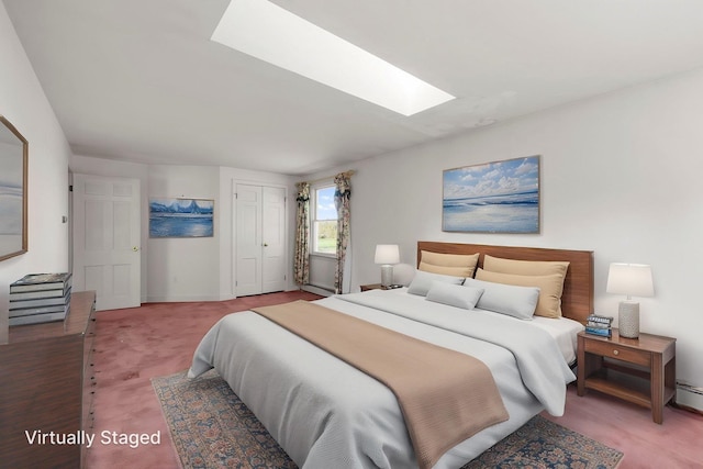44 Weare Rd, Seabrook, NH 03874 - bedroom featuring a skylight, baseboards, and wood finished floors