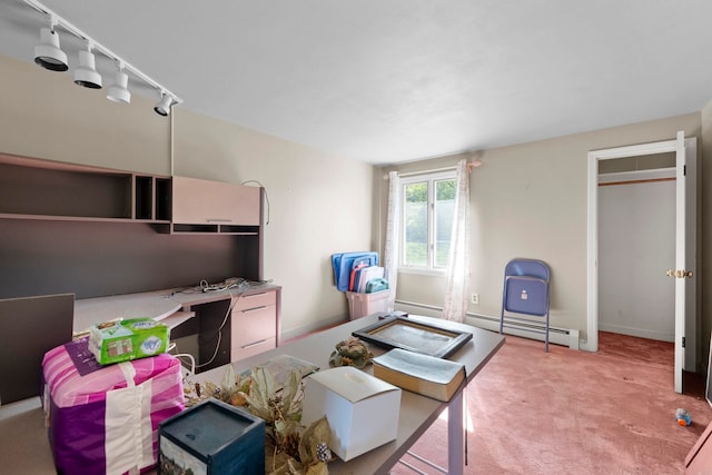 44 Weare Rd, Seabrook, NH 03874 - living area with carpet, a desk, track lighting, and baseboard heating