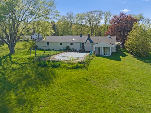 44 Weare Rd, Seabrook, NH 03874 - back of property with a chimney