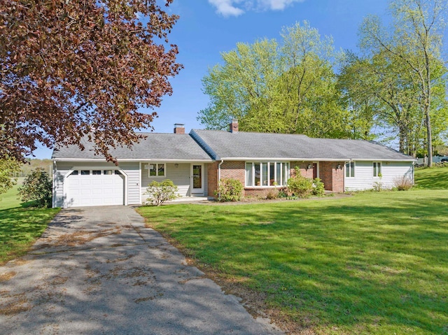 44 Weare Rd, Seabrook, NH 03874 - ranch-style house featuring driveway, a garage, a front lawn, a chimney, and brick siding
