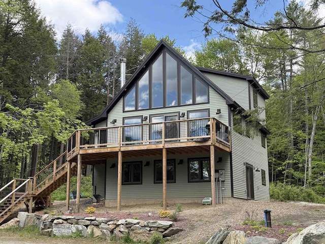 62 Highland Vws N, Ludlow, VT 05149 - back of property featuring stairs and a deck
