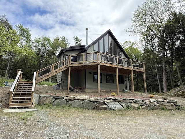 62 Highland Vws N, Ludlow, VT 05149 - rear view of property with stairs and a deck
