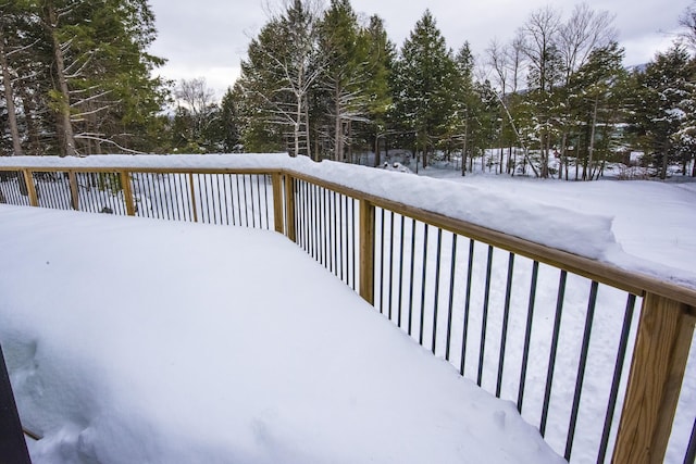 62 Highland Vws N, Ludlow, VT 05149 - snow covered deck featuring view of wooded area